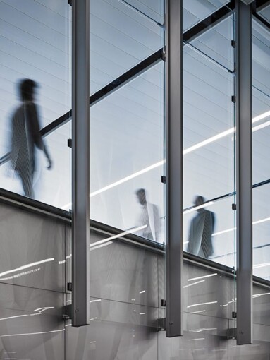 Custom glass wall-cladding on GeoLite Honeycomb Backer elevator at the United Airlines Terminal at Lax and etched on glass by Skyline Design, the industry-leading architectural glass manufacturer.