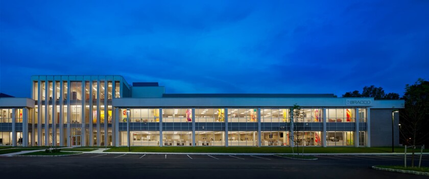 A piece of custom glass partition designed by KSS Architects and printed on a glass partition of Bracco Diagnostics by Skyline Design, the industry-leading architectural glass manufacturer